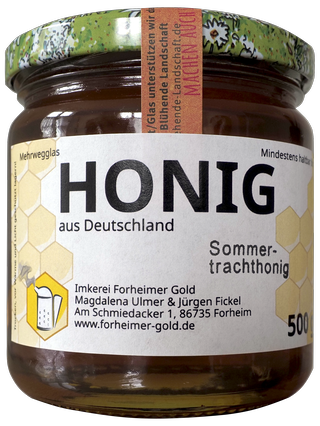 Summer honey in jar